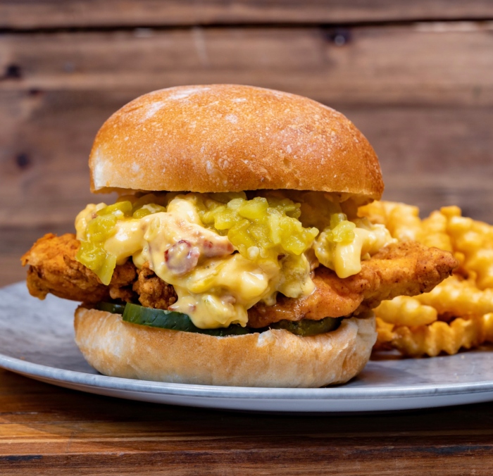 Bacon-Green Chile Mac and Cheese Fried Chicken Sandwich is a yummy and spicy sandwich that you can only get at Smokejumpers Grill in Disney California Adventure!