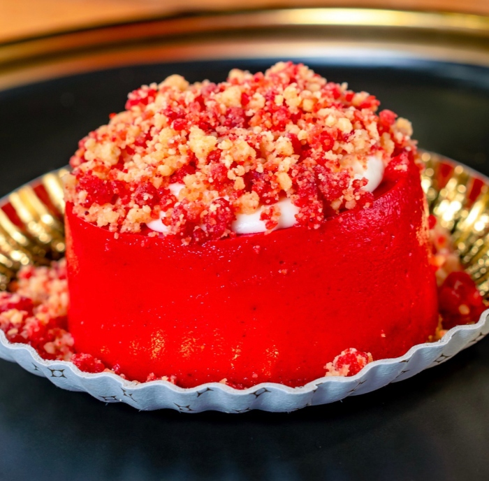 Strawberry Crunch Cheesecake is a sweet treat that you can get at Boardwalk Pizza & Pasta in Disney California Adventure.