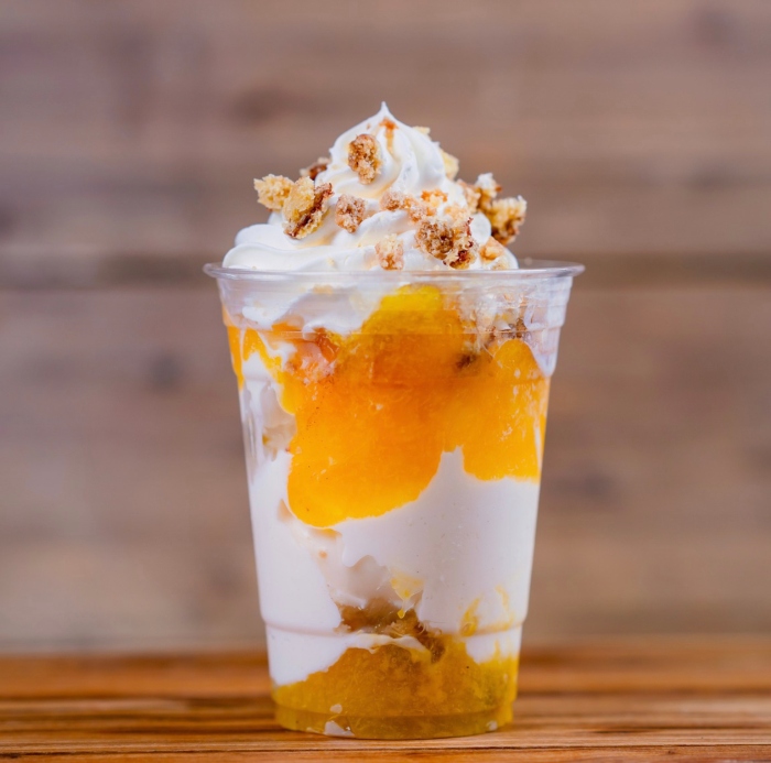 Get out of the heat and go to The Golden Horseshoe and order a Peach Cobbler Sundae!