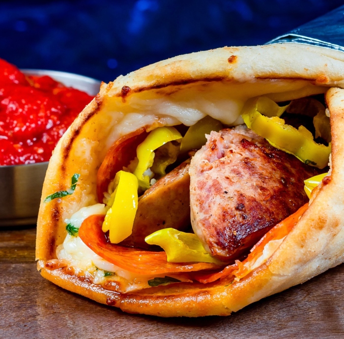 Shawarm-izza is a twist on two iconic food items.. .a pizza and shawarma. Grab this item at Shawarma Palace in Disney California Adventure.