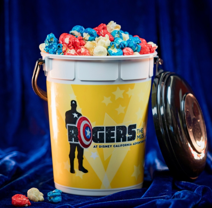 Get a Rogers: The Musical Popcorn Bucket that comes with Kettle Corn which is Red, white, and blue caramel corn.