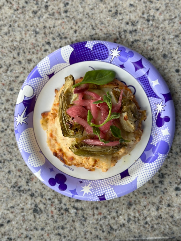 Artichoke Pizzetta is a must-have item that you should get a Food and Wine Festival 2023