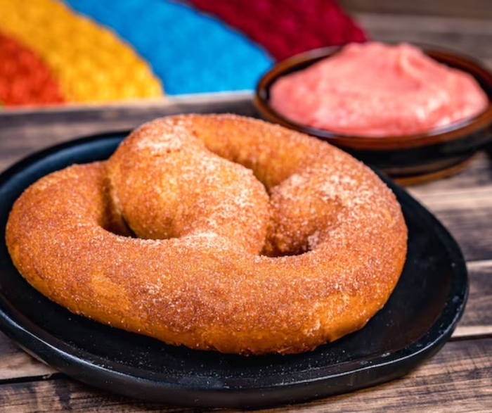 You can get a Cream Cheese Pretzel with a Guava dipping sauce at the Big Thunder Mountain Railroad Pretzel Cart at Disneyland!