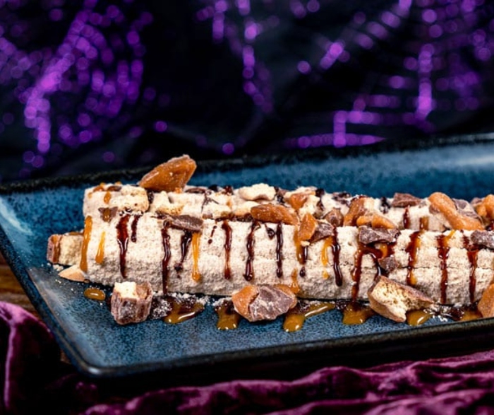 Candy lovers rejoice! You can grab yourself a Trick or Treat Sweets Churro at Disneyland this Halloween season!