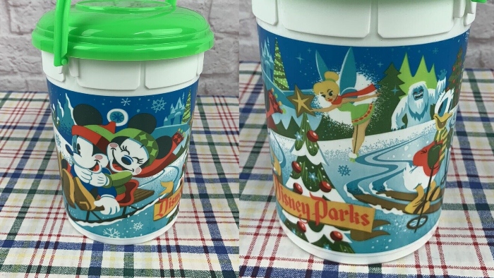 In the Holiday season at Disneyland in 2021, you were able to buy a popcorn bucket that showed Mickey and friends playing in a winter wonderland.