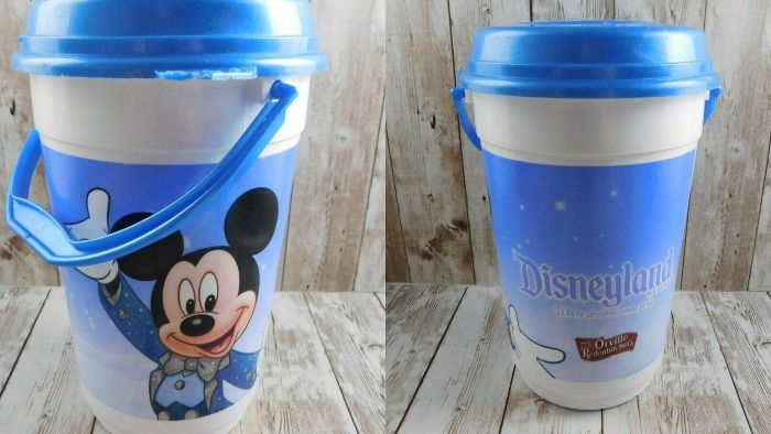 Mickey Mouse is welcoming you to Disneyland aka Where Dreams Come True in this popcorn bucket that was sold in 1992.