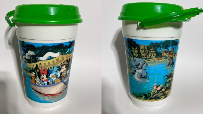 Mickey Mouse and his friends are taking a ride on the Jungle Cruise in this Disneyland popcorn bucket.