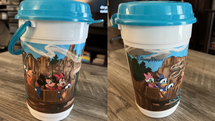 On this Disneyland popcorn bucket, it shows Mickey and his friends enjoying a ride on the Big Thunder Mountain.