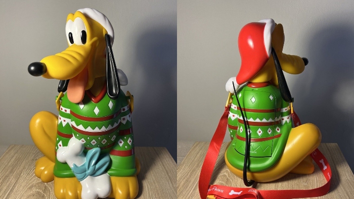 For the Christmas season in 2018, Disneyland sold a popcorn bucket that was shaped like Pluto who is wearing a Christmas sweater.