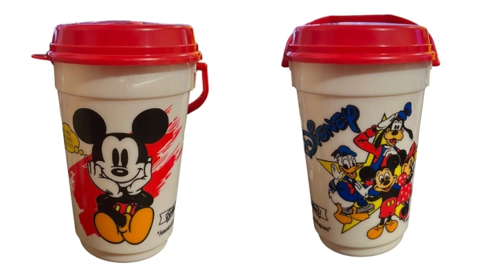 Mickey Mouse loves his popcorn in this 1995 popcorn bucket that was sold at Disneyland.