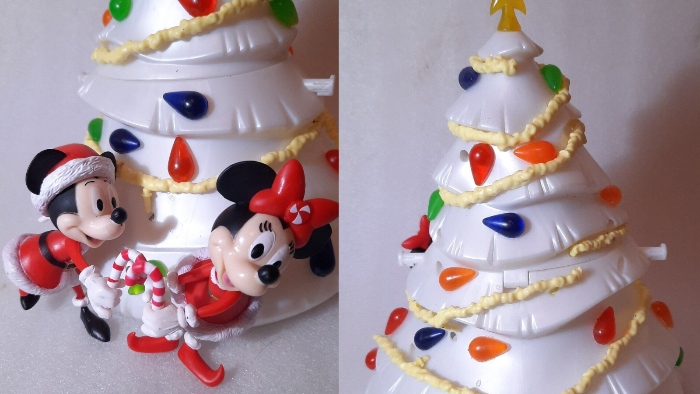 In the Holiday season of 2021, Disneyland guests were able to purchase a white Christmas tree with Mickey Mouse and Minnie Mouse having a candy cane.