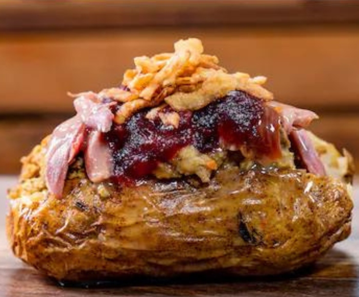 Disneyland is selling a baked potato that is filled with yummy Thanksgiving food items!