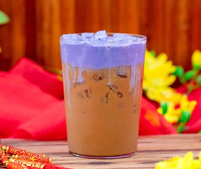 For the cold brew lovers! This is a Taro Vietnamese-style Iced Coffee that you can order at Bamboo Blessings during Disney Lunar New Year Food Festival